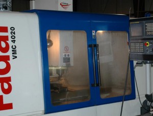 Machine for manufacturing tools and parts